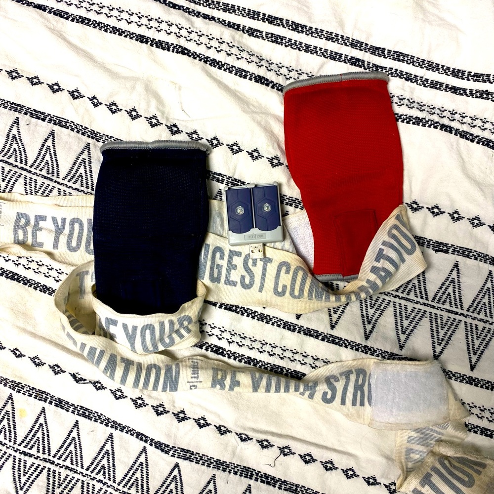 FightCamp connect trackers and charger